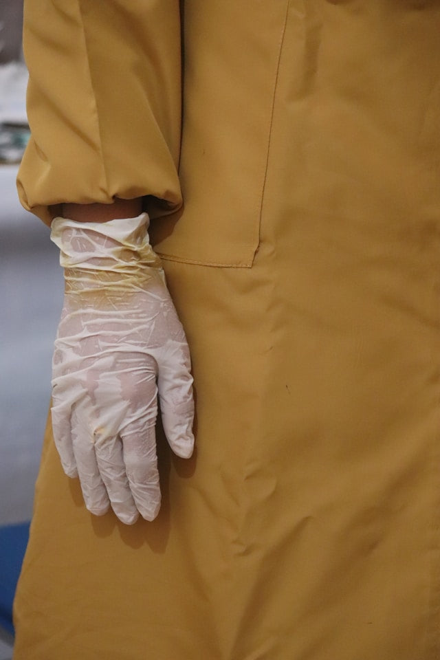How to Organize Disposable Glove Boxes in a Cleaning Closet or Utility Area