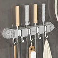 Broom Holder Wall Mount Sturdy Mop and Broom Organizer with 4 Racks and 5 Hooks Vacuum Suction Cup Broom Mop Holder for Home, kitchen, Garden, Tools, Garage (grey)