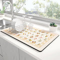 Rnivvi Dish Drying Mat for Kitchen Counter, 12 x 19" Cute Flower Theme Super Absorbent Draining Pad, Non-Slip Heat Resistant Coffee Bar Mat for Coffee Machine Station Accessories, Beige Dish Rack Pad
